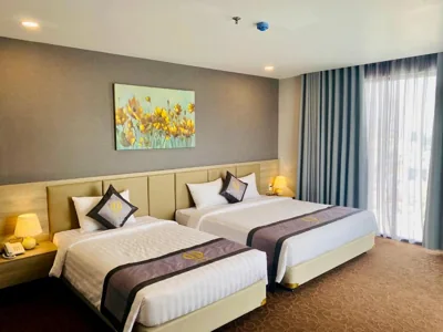 Habitación Deluxe Triple — Hera Luxury Hotel